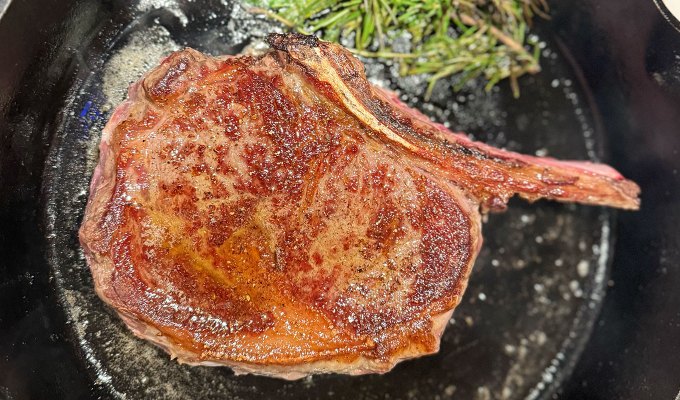 best steak delivery: crowd cow cowboy steak, cooking in a pan