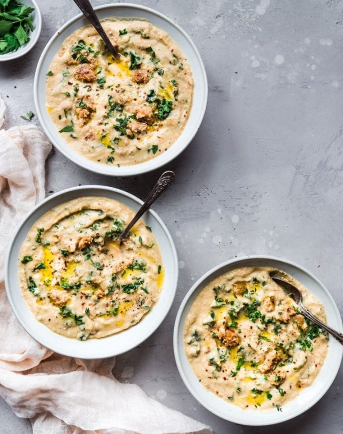 high protein soups: creamy vegan cauliflower soup with sausage and kale